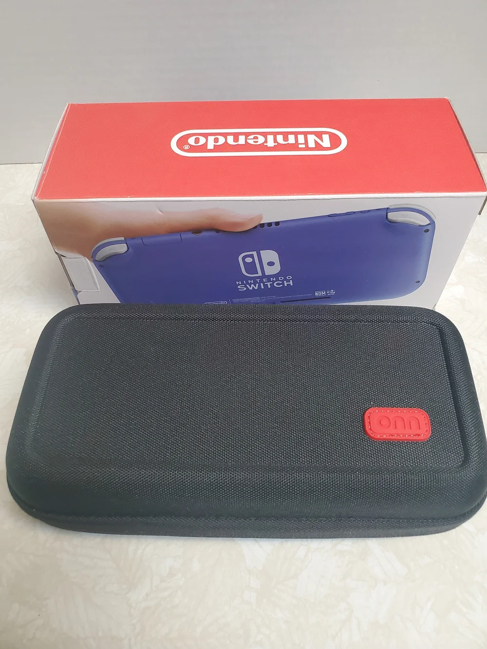 Nintendo Switch Lite Blue Handheld Console with Black Carry Case/ 3 Games